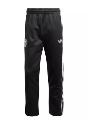 adidas three-stripe embroidered track pants - Black
