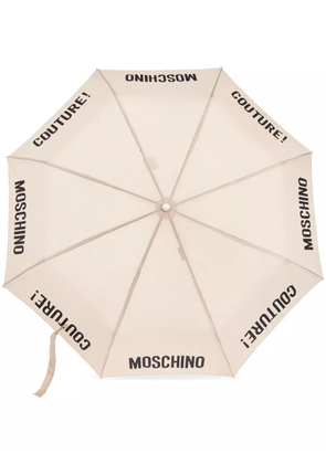 Moschino logo-print compact umbrella - Neutrals