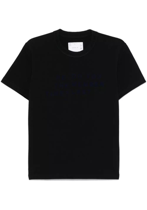 sacai flocked-slogan T-shirt - Black