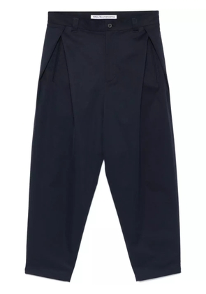 White Mountaineering tapered trousers - Blue