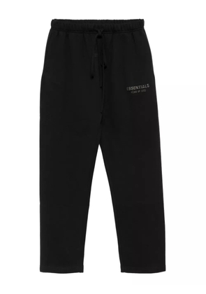 FEAR OF GOD ESSENTIALS logo-embossed trousers - Black