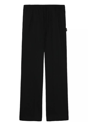 Undercover wide-leg trousers - Black