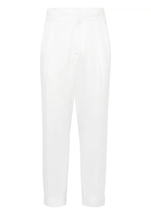 Brunello Cucinelli pressed-crease cotton trousers - White
