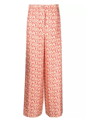 Versace Versace Allover silk trousers - Pink