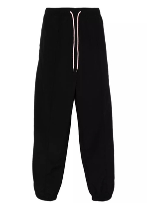 COUNTY OF MILAN Cross-motif track pants - Black