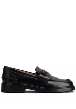 Tod's logo-plaque leather loafers - Black
