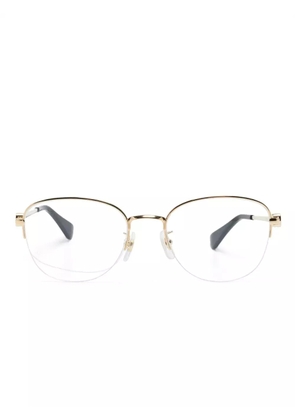 Cartier Eyewear logo-plaque round-frame glasses - Gold