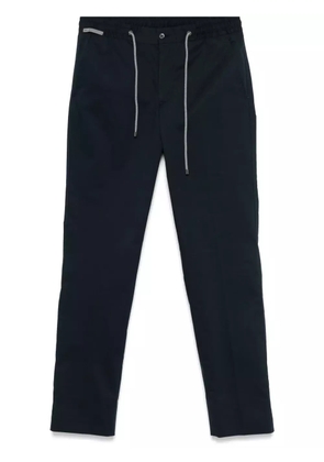 Corneliani tapered-leg tapered trousers - Blue