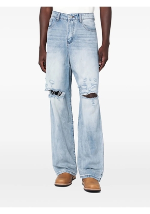 BASKETCASE GALLERY distressed-knee jeans - Blue
