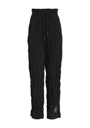 Osklen crinkled-effect trousers - Black