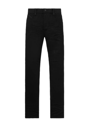 RTA Bryant logo-print skinny jeans - Black