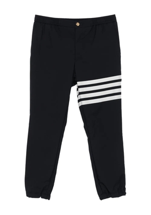 Thom Browne four-stripe wool track pants - Blue