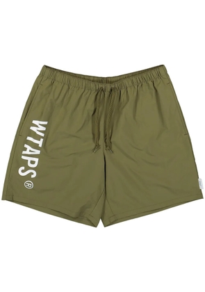 WTAPS elasticated logo-print shorts - Green
