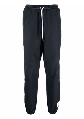 Thom Browne name-tag track pants - Blue