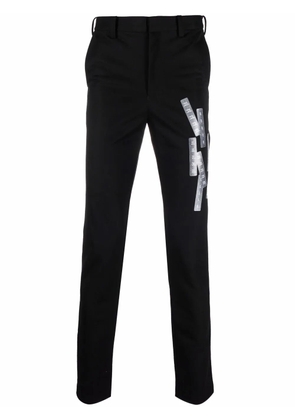 Doublet label-print straight-leg trousers - Black