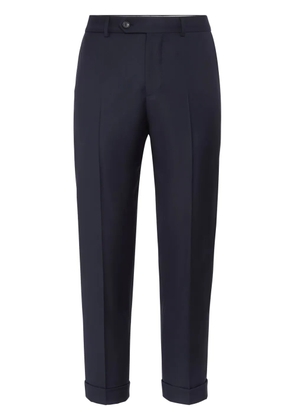 Brunello Cucinelli tapered-leg wool trousers - Blue