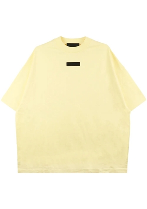 FEAR OF GOD ESSENTIALS logo-appliqué cotton T-shirt - Yellow