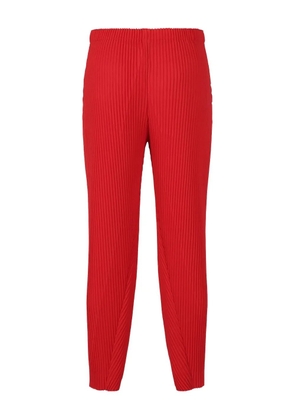 Homme Plissé Issey Miyake pleated trousers - Red