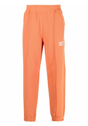 Helmut Lang logo-print tapered joggers - Orange