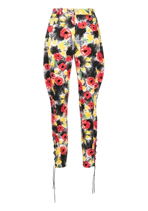 CHANEL Pre-Owned 1997 camellia-print slim-cut trousers - Multicolour
