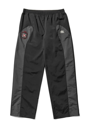 UMBRO panelled logo-patch track pants - Black