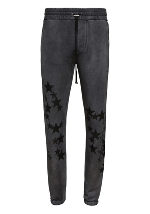 AMIRI Pigment Spray Star track pants - Black