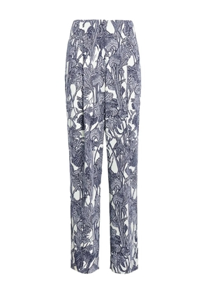 Roberto Cavalli iris-print trousers - Blue