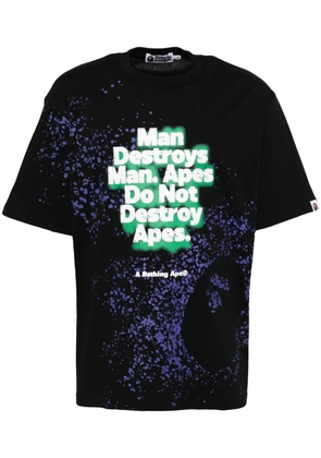 A BATHING APE® spray-print slogan T-shirt - Black
