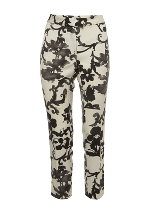 Moschino Pre-Owned floral-print trousers - Neutrals
