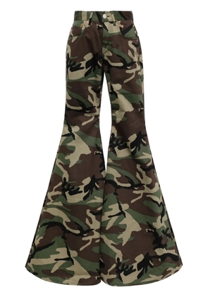 VETEMENTS camouflage-print flared trousers - Green