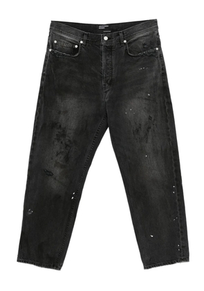 Enfants Riches Déprimés paint-splatter distressed jeans - Black