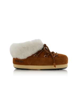 MOON BOOT EVX Sheepskin Mules - Moda Operandi