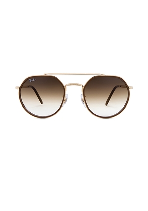 Ray-Ban Round Sunglasses in Metallic Gold.