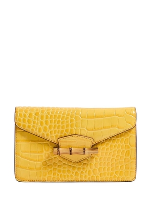 Pamela Munson The Jackie crocodile-effect clutch bag - Yellow