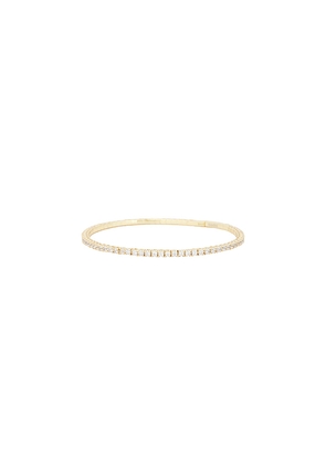 SHASHI Bianca Flexi Bangle Bracelet in Metallic Gold.