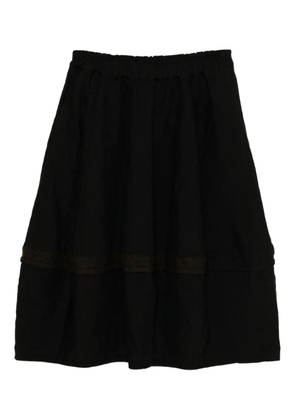 Black Comme Des Garçons panelled skirt