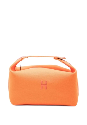 Hermès Pre-Owned 2010-2025 Large Toile Bride A Brac Case vanity bag - Orange