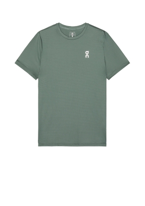 On Core-T in Olive - Olive. Size L (also in M, XL/1X).