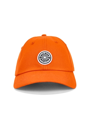 Malbon Golf Waxed Cotton Strapback Hat in Orange.
