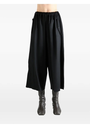 Comme des Garçons TAO button-detail trousers - Black