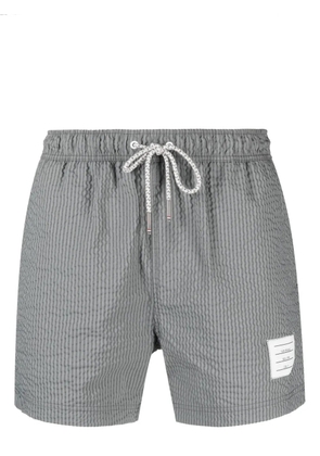 Thom Browne striped seersucker-texture swim shorts - Grey