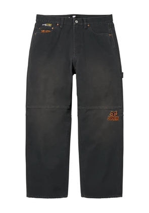 Supreme x Fox Racing® logo-detailed trousers - Black