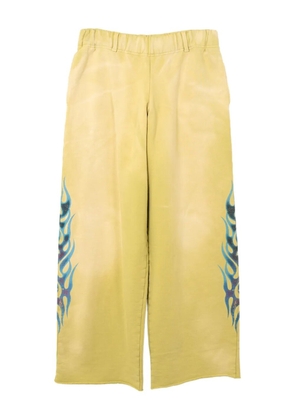 KAMIYA flame-print distressed trousers - Yellow