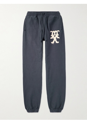 SAINT MXXXXXX - Tapered Logo-Print Cotton-Blend Jersey Sweatpants - Men - Blue - S