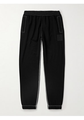 Givenchy - Tapered Logo-Appliquéd Cotton-Jersey Sweatpants - Men - Black - S