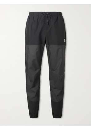 DISTRICT VISION - Zanzie Tapered Logo-Print Recycled-Shell Track Pants - Men - Black - S