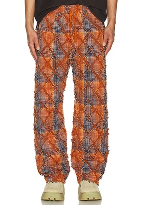 Pleasures Mystic Flannel Pants in Orange - Orange. Size S (also in L, M, XL/1X).