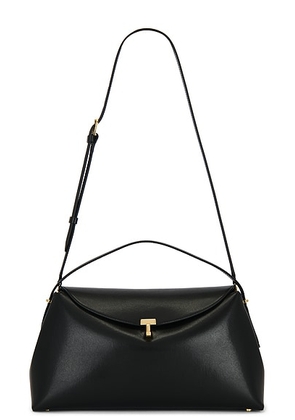 Toteme T-Lock Top Handle Bag in Black - Black. Size all.