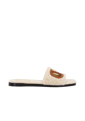Valentino Garavani V Logo Cut Out Slide in Naturale & Selleria - Ivory. Size 36.5 (also in 37, 37.5, 38, 38.5, 39, 39.5, 41).