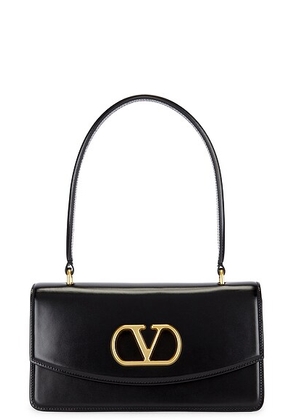 Valentino Garavani Vain Top Handle Bag in Nero - Black. Size all.